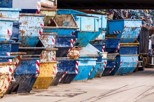 Professionals clearing a cluttered garage in London
